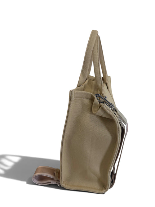 Zimoras Boutique beige canvas tote bag with side view, featuring sturdy handles and a minimalist luxury design.