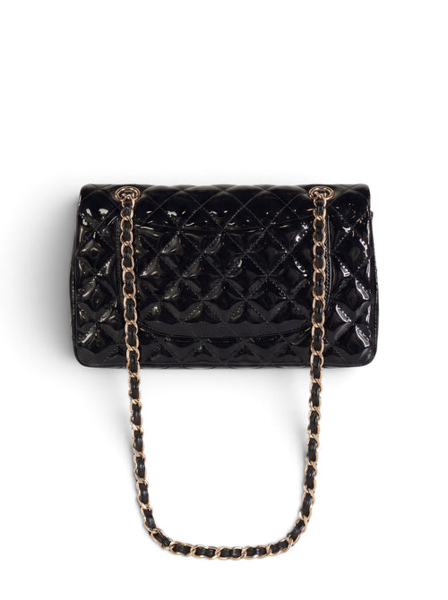 Zimoras Boutique black quilted patent vegan leather shoulder bag with gold-tone chain straps and turn-lock closure.