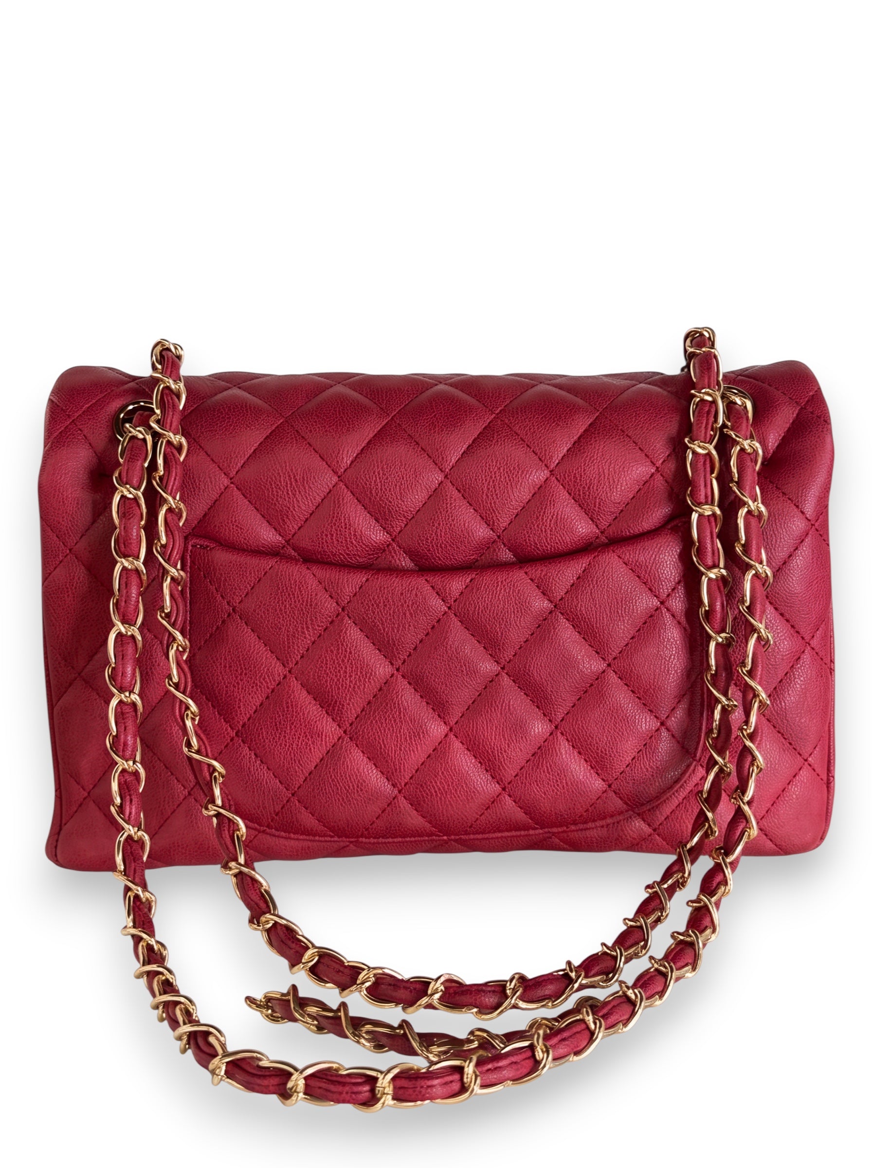 Zimoras Boutique quilted red patent leather shoulder bag with gold chain straps and a classic structured design.